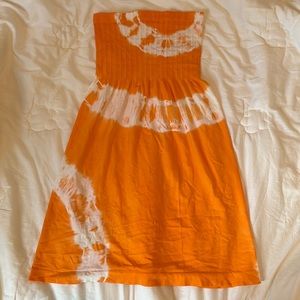 Orange tie-dye dress.